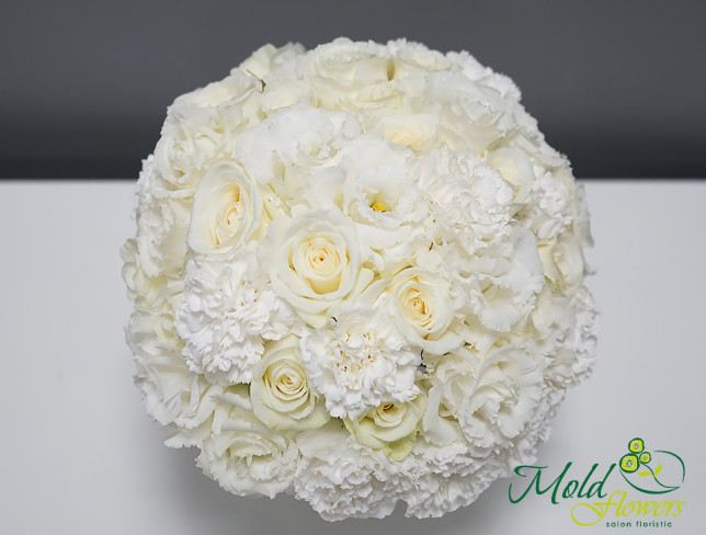 White bridal bouquet with roses, eustoma, and carnations photo